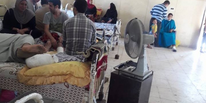 ملف:الجنرال يخرج لسانه للشعب ويفتتح مستشفى عسكريا.jpg