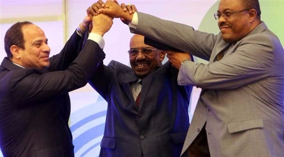 ملف:في لقاء تشابك الأيدي...jpg
