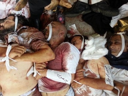 جانب من صور شهداء المجزرة ملف مصور 4.jpg