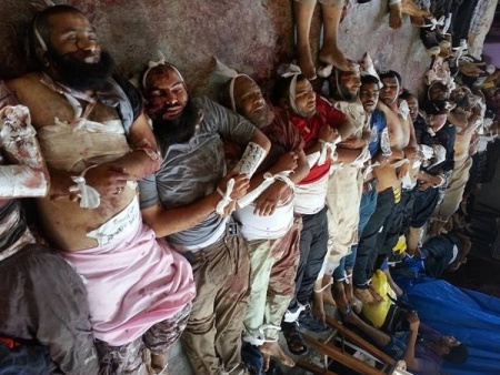 جانب من صور شهداء المجزرة ملف مصور 1.jpg