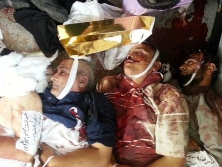 جانب من صور شهداء المجزرة ملف مصور 3.jpg