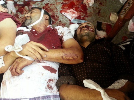 جانب من صور شهداء المجزرة ملف مصور 2.jpg